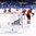 GANGNEUNG, SOUTH KOREA - FEBRUARY 20: Switzerland's Evelina Raselli #14 celebrates after scoring a first period goal on Japan's Nana Fujimoto #1 during classification round action at the PyeongChang 2018 Olympic Winter Games. (Photo by Matt Zambonin/HHOF-IIHF Images)

